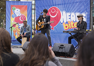 A photo of the band Parachute performing in Malcolm X Plaza.